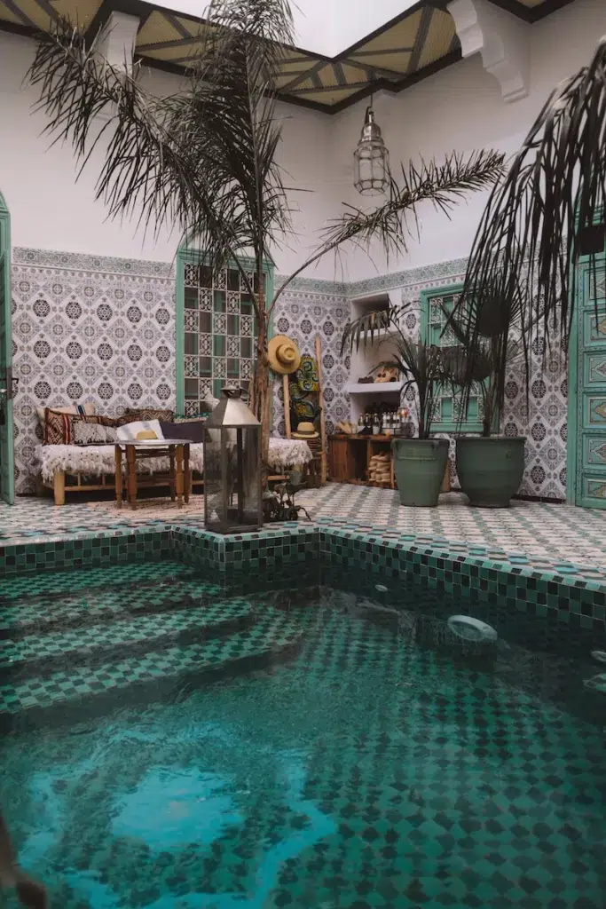 Marrakech  ground pool near wooden lounges