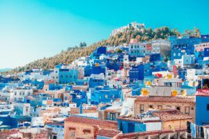Revel in the Blue City: The Allure of Chefchaouen blue and white painted houses on the cliff